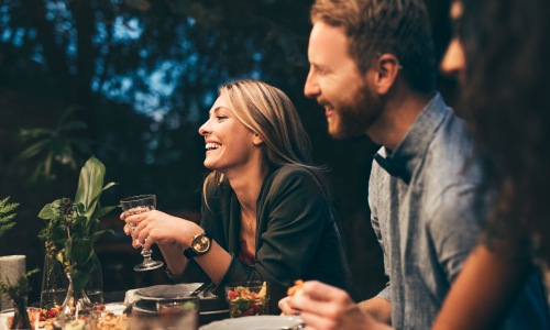 a couple outside in a restaurant